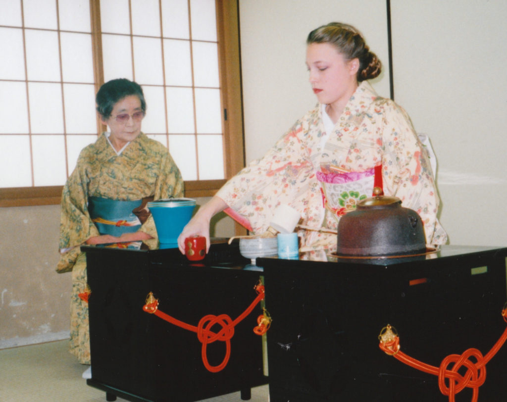 Photo of Jessica performing a tea ceremony